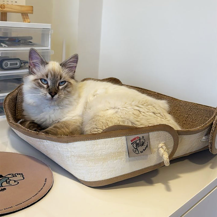 Cama rascador par gatos.