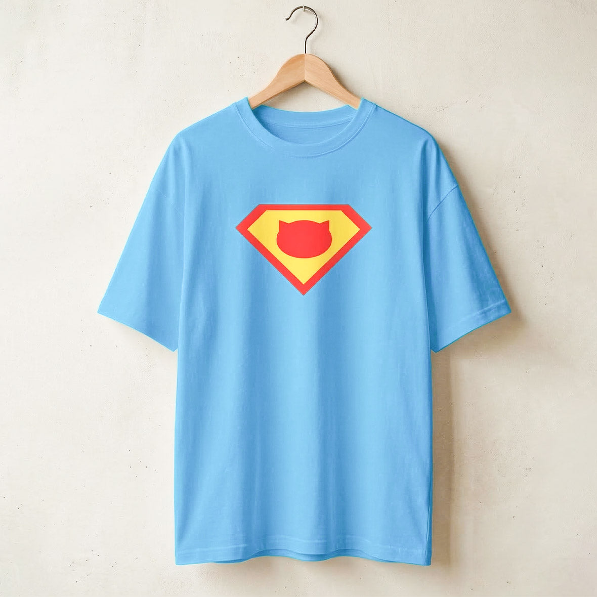 Camiseta amplia tela fría poliéster alto gramaje estampado super cat unisex
