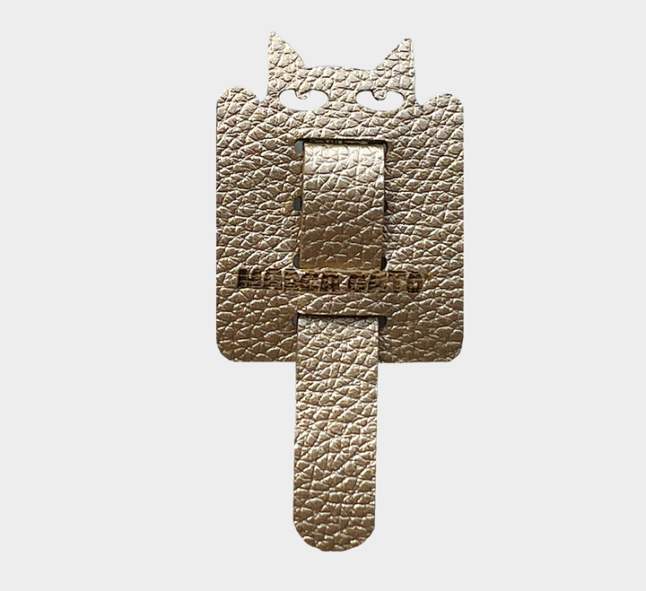 Organizador de cables de cuero vegano con forma de gato